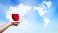 International Human Solidarity Day concept: hands holding red heart health insurance Royalty Free Stock Photo