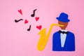 International Jazz Day. A silhouette of a musician with a saxophone from which hearts and melodies flew out, on a pink background