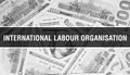 International Labour Organisation text Concept Closeup. American Dollars Cash Money,3D rendering. International Labour