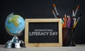 International Literacy Day. World Globe, School Stationary and A