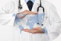 International medical coverage insurance concept, hands doctor covering world map symbol on white background, copy space