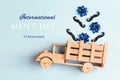 International men`s day card with wooden toy truck with mustache and bows in the back on blue background. F Royalty Free Stock Photo