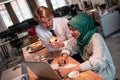 International multicultural business team.A young business man and woman sit in a modern relaxation space and talk about