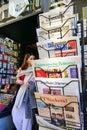 international newspapers stack on display for foreigner tourists visiting the city Turin Italy Royalty Free Stock Photo