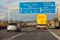 International parcel service DHL truck, drives on german freeway
