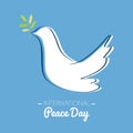 International peace day with drawing of a dove with olive branch Royalty Free Stock Photo