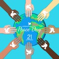 International peace day multiracial hands holding doves around the earth planet banner design paper cut