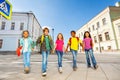 International schoolchildren walk and hold hands Royalty Free Stock Photo