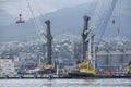 The international sea port of Novorossiysk. Port cranes and industrial objects. Marine Station.