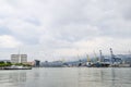 The international sea port of Novorossiysk. Port cranes and industrial objects. Marine Station.