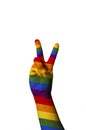 International sign for peace and love gesturing on white background gay pride rainbow flag Royalty Free Stock Photo
