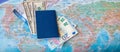 International travel concep: Passport, tickets, money on the map Royalty Free Stock Photo