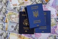 International Ukrainian passport with dual citizens US Passport hryvnia banknotes and US dollar bills