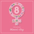 International Women`s Day concept. Female symbol decorated with flowers and leaves and 8 numbers on a pink background. Equality, Royalty Free Stock Photo