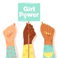 International Women`s Day concept. Woman`s fists showing their power. GirlÃ¢â¬â¢s hand holding a nameplates with inscription `Girl p