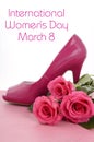 International Womens Day, March 8, ladies pink high heel stiletto shoe and roses Royalty Free Stock Photo