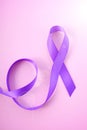 International Womens Day Purple Ribbon Symbol woth lens flare Royalty Free Stock Photo