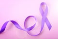 International Womens Day Purple Ribbon Symbol woth lens flare