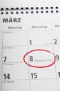 Internationaler Frauentag or international women's day on March 8 circled in german calendar Royalty Free Stock Photo