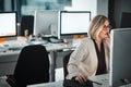 Internet access is a business communications lifeline. a businesswoman sitting at her desk. Royalty Free Stock Photo