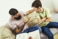 Internet addicted boy visiting therapist with his father Royalty Free Stock Photo