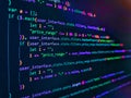 Internet app development and design. Data bits computer bits, shadow and dark vignette effect. Script on computer with source code Royalty Free Stock Photo