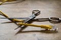 Yellow Internet cable cut by scissors Royalty Free Stock Photo