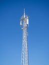 Internet and cell phone tower. Internet communications. Communication concept. White tower against the sky