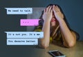 Internet chat composite with young woman desperate suffering pain dumped by his boyfriend via mobile phone receiving painful text Royalty Free Stock Photo