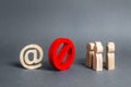 An internet email symbol and a group of people are separated by a red prohibitory symbol No. restrictions on access to the global