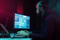 Internet fraud, darknet, data thiefs, cybercrime. Hacker attack on government server. Dangerous criminals coding virus