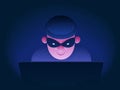 Internet fraud. Hacker behind a laptop monitor. Phishing and online surveillance. Identity theft and hacking of bank Royalty Free Stock Photo