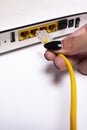 Internet modem and ethernet cable connection Royalty Free Stock Photo