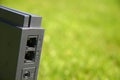 Internet modem on green grass Royalty Free Stock Photo