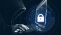 Internet network security system. Hacker in black hoodie using computer laptop