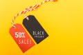 Internet online shopping, Promotion Black Friday text on black tag and 50% sale text on red tag Royalty Free Stock Photo