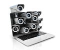 Internet privacy concept - laptop and surveillance camera