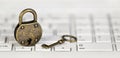 Internet privacy, web security concept, padlock and key on a white keyboard Royalty Free Stock Photo