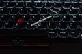 Internet privacy, web security,metallic key on a black computer laptop keyboard Royalty Free Stock Photo