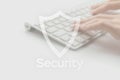 Internet security computer data symbol on blured keyboard background. Hacker attack and data breach, information leak