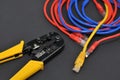 internet or telephone line cables and crimper Royalty Free Stock Photo