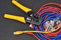 internet or telephone line cables and crimper Royalty Free Stock Photo