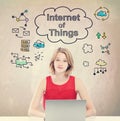 Internet of Things concept with young woman with laptop Royalty Free Stock Photo