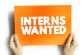 INTERNS WANTED text concept on card for presentations and reports Royalty Free Stock Photo