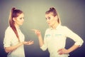 Two girls having argument, interpersonal conflict Royalty Free Stock Photo