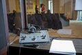 Interpreting - Microphone and switchboard in an simultaneous interpreter booth . Soft focus of wireless Conference microphones and Royalty Free Stock Photo