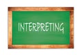 INTERPRETING text written on green school board Royalty Free Stock Photo