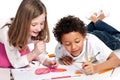 Interracial children drawing together