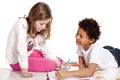 Interracial children drawing together