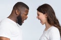 Interracial couple arguing, yelling at each other, having relationship crisis Royalty Free Stock Photo